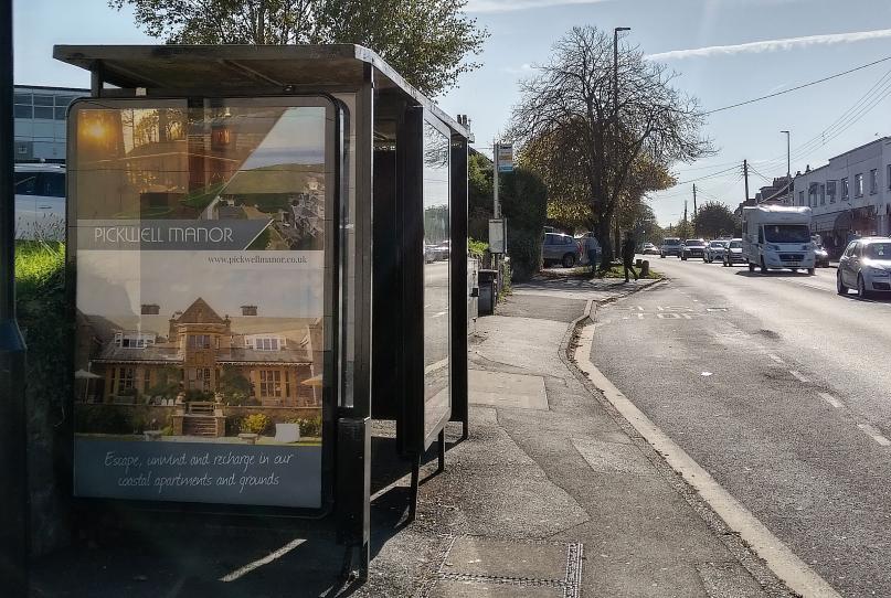 Advertising graphics for bus stop advertising a local accommodation venue 