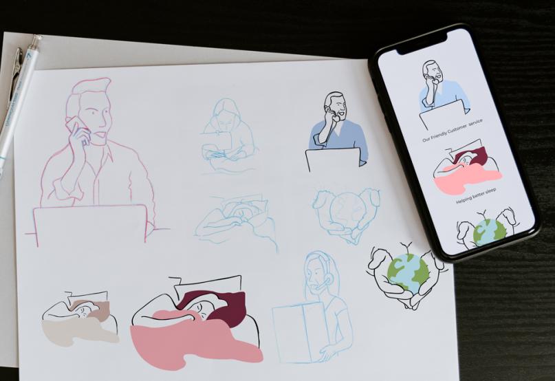 Sketches and digital artworks alongside a mobile view of illustrations